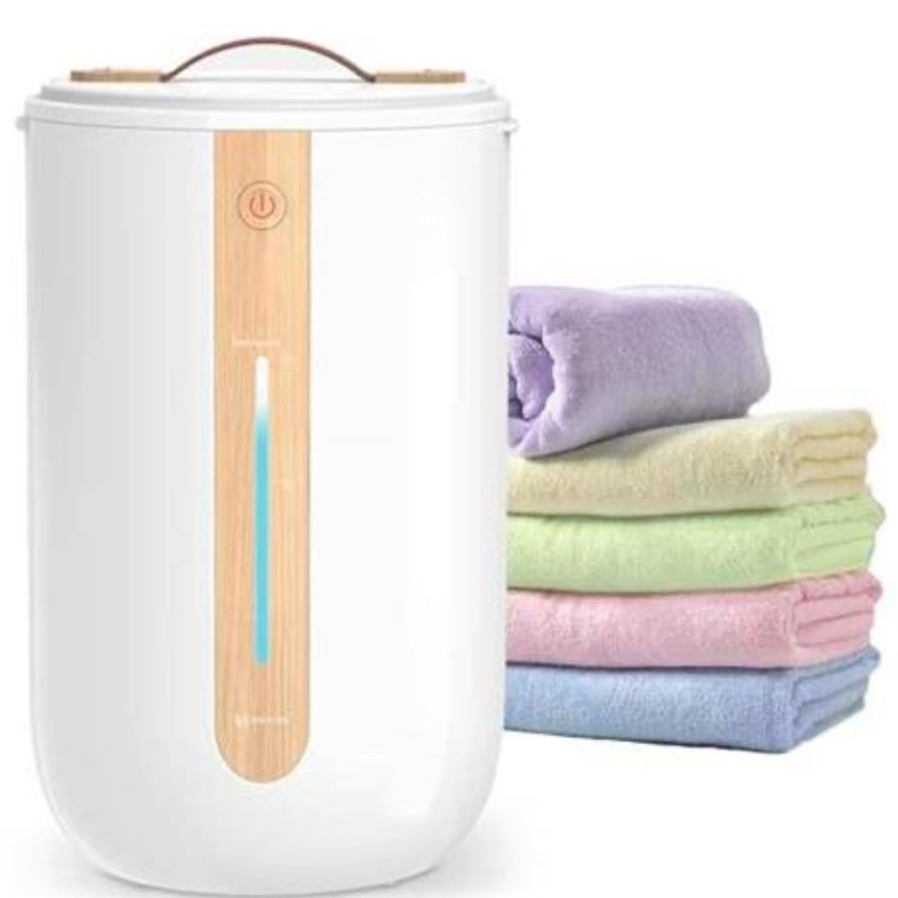 White Towel Warmer with Pastel Towels